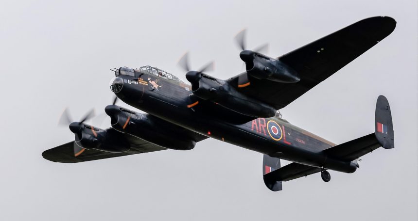 Against grey skies Lancaster PA474 departs from Coningsby to fly to Duxford on 29th October. Photo Malcolm Shorter