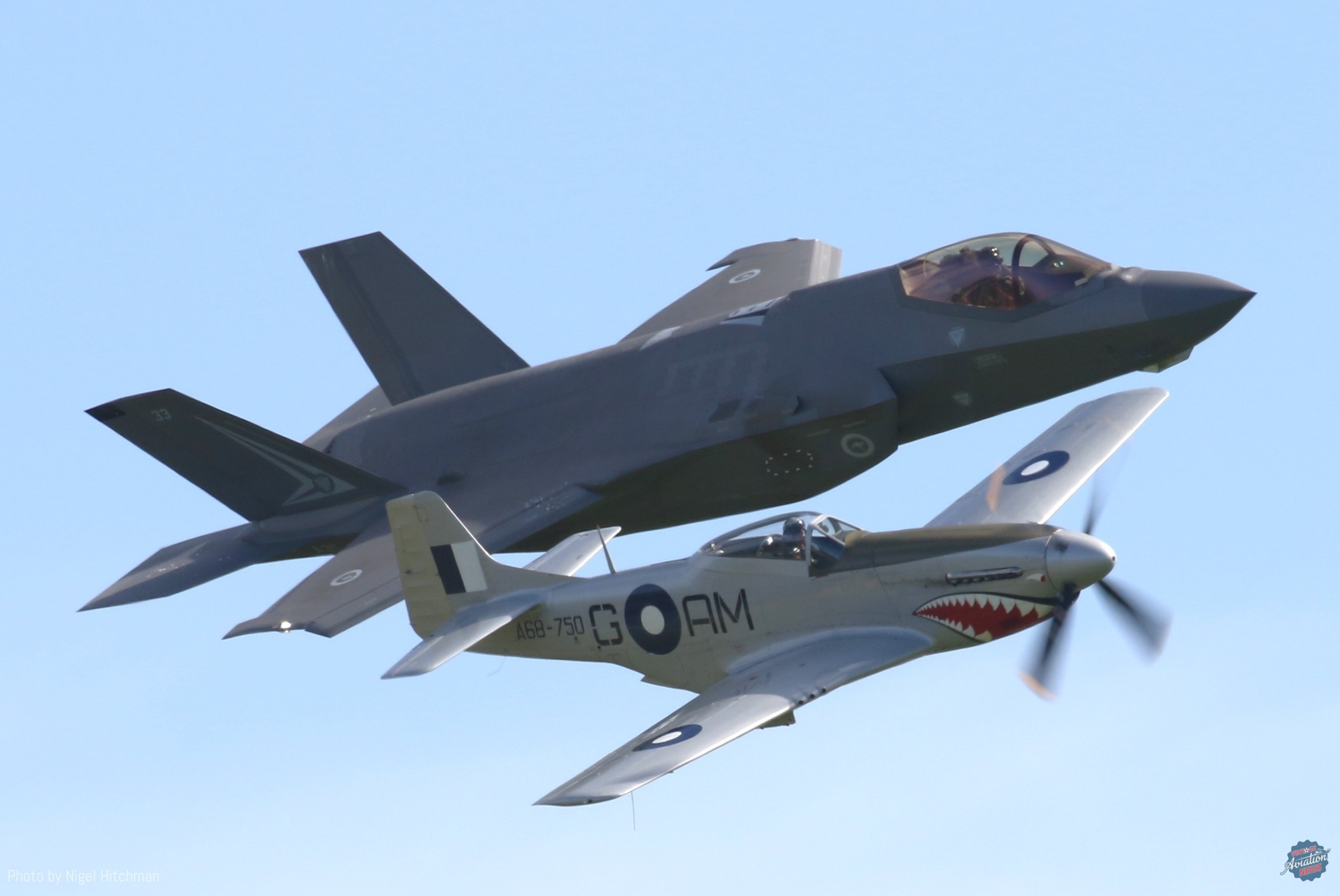 The past and future of the RAAF: 100 Sqn's CAC Mustang leads its modern counterpart, F-35A A35-33 of 2 OCU, in a heritage flypast. [Photo by Nigel Hitchman]