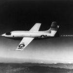 Bell X 1 46 062 in flight with shock diamonds.