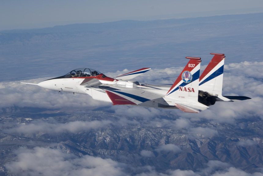 Antennas used for the Space-Based Range Demonstration and Certification project protrude from the top of NASA’s F-15B testbed during a research flight.