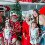 Naval Air Station Wildwood Aviation Museum Presents Christmas in July 15 Family with Mr. Mrs. Claus at Christmas in July 2023 1