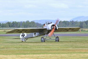 TVAL's Fokker Eindecker reproduction ZK-EIN taxis back in after another successful sortie. [Photo by Paul Le Roy]