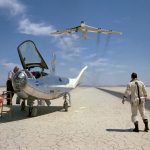 Flight Test Files: Northrop HL-10 - Solving the Aerodynamics of Reentry 11 NASA research pilot Bill Dana takes a moment to watch NASA's NB-52B cruise overhead after a research flight in the HL-10.