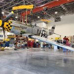 National Air and Space Museum Prepares for a New WWII Gallery 15 P 51D being lifted in a 22 degree roll in the Engen Restoration Hangar Smithsonian Photo by Richard Snell